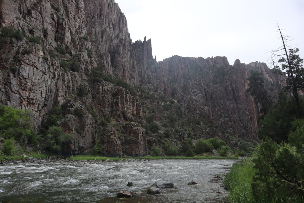 The river, right alongside the jagged cliffs of Black Canyon. 