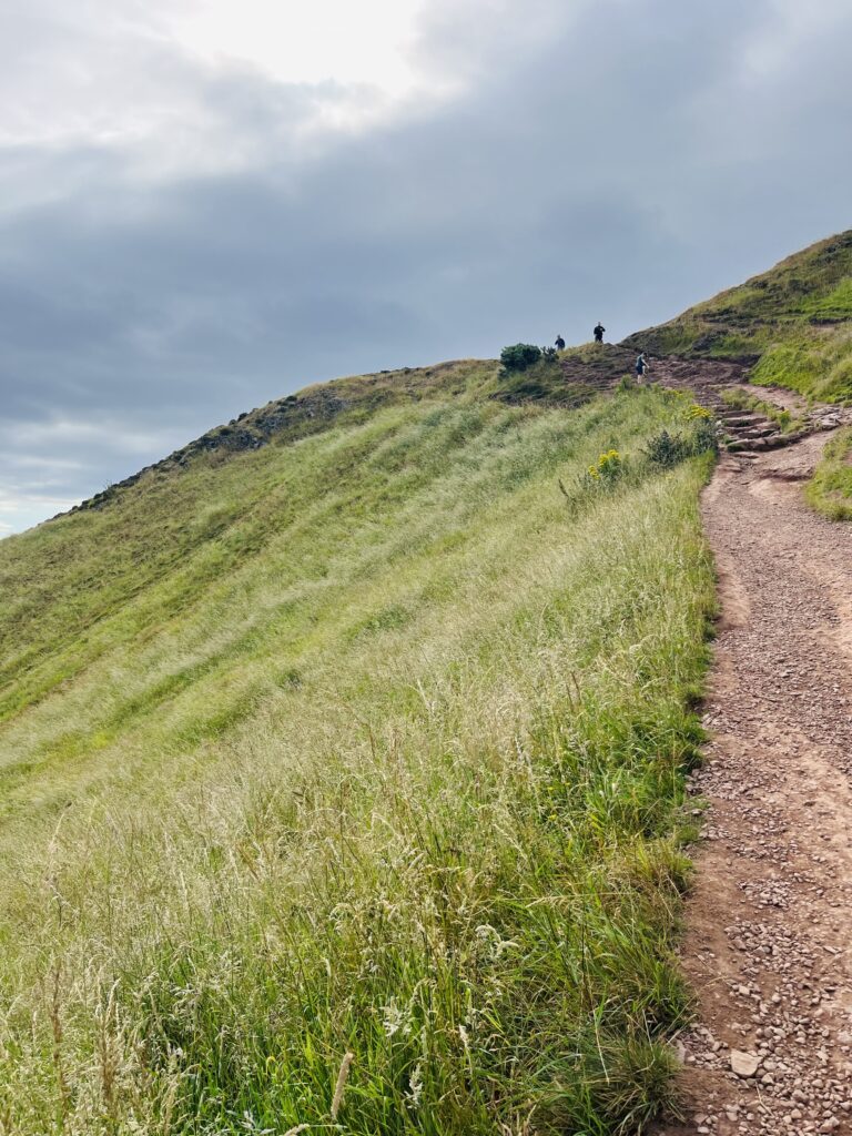 The hike along Arthur's Seat in Edinburgh. There is a steep hill, as well as a hiking trail. 